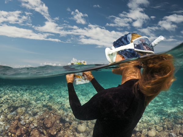 Caitlin Rentell surveying coral