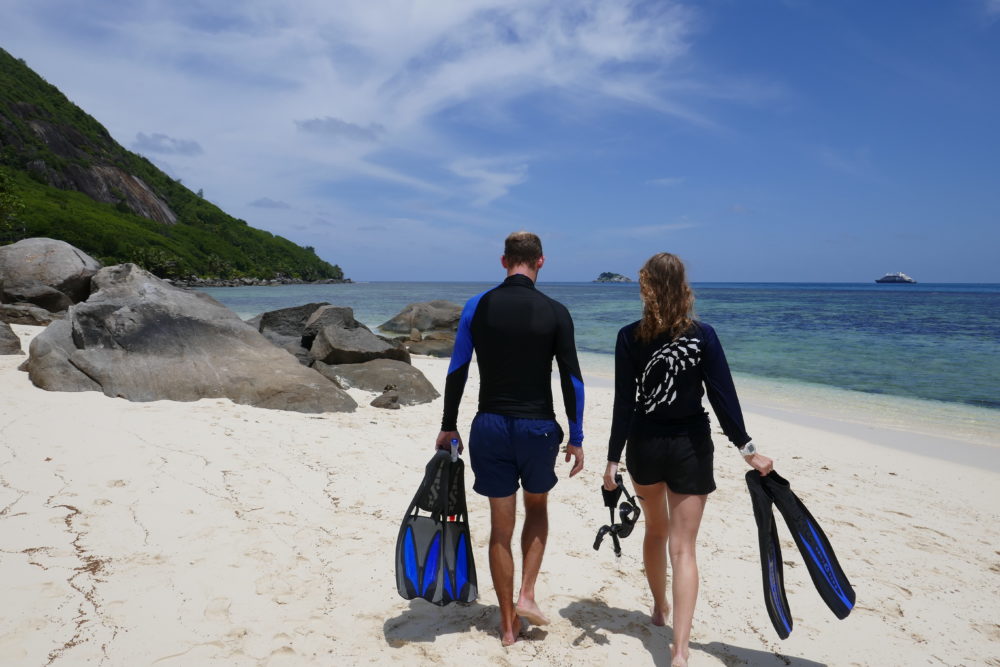 WiseOceans Marine Educator Vanessa with Guest getting ready to Snorkel at Club Med Seychelles