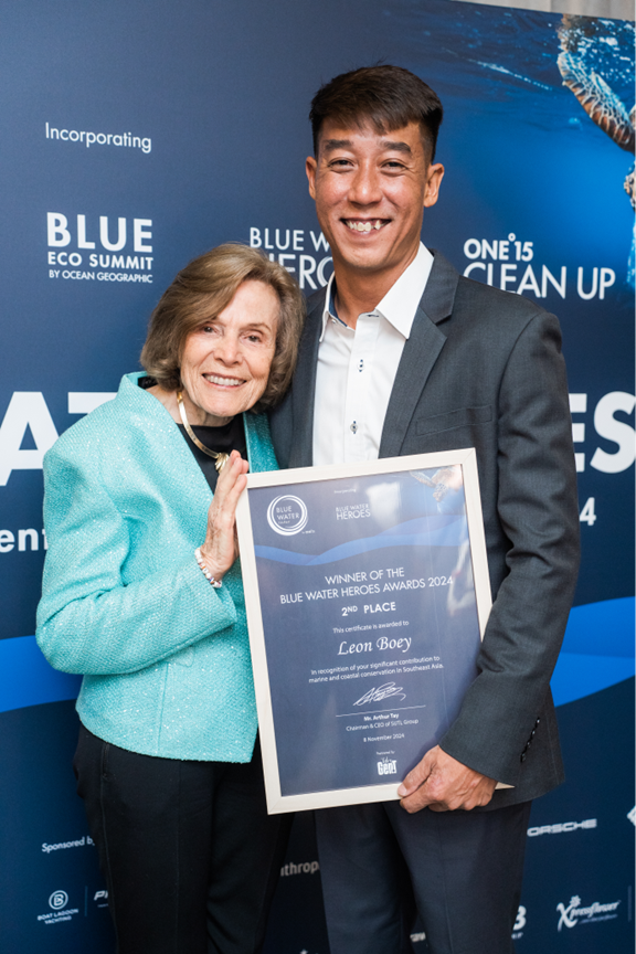Leon Boey winning an award